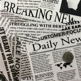NEWSPAPER CLIPPINGS